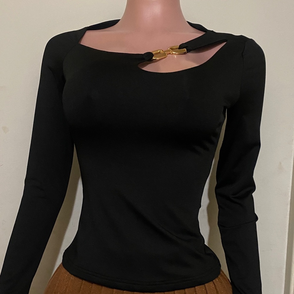 Chic Black Long Sleeve Top with Gold Accent